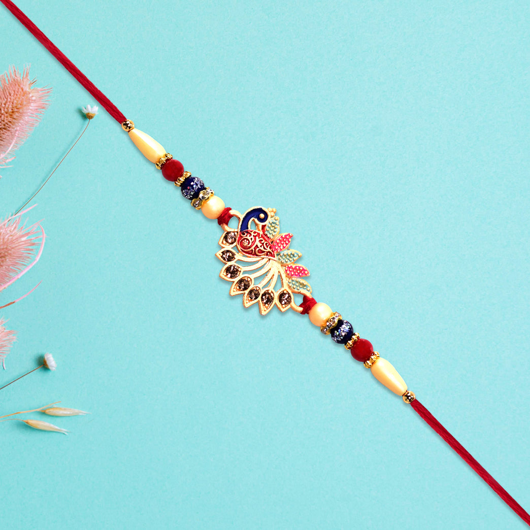 Colorful Peacock Rakhi With Stone Detailing And Red Thread