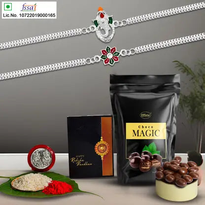 Rakhi Gift Combo With 2 Elegant Rakhis For Brother  Includes Choco Magic Pack Silver Coin Roli Chawal  Greeting Card