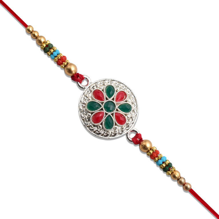 Silver Plated Floral Rakhi With Red  Green Stones