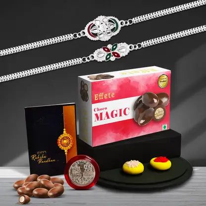 Rakhi Gift Combo With 2 Elegant Rakhis For Brother  Includes Choco Magic Box Silver Coin Roli Chawal  Greeting Card