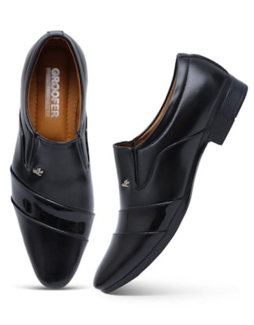 Solid black slip on shoes